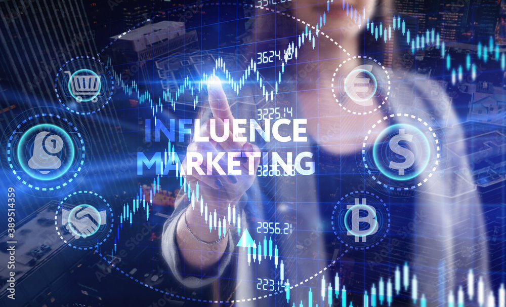 Business, Technology, Internet and network concept. Young businessman working on a virtual screen of the future and sees the inscription: Influence marketing Business, Technology, Internet and network concept. Young businessman working on a virtual screen of the future and sees the inscription: Influence marketing