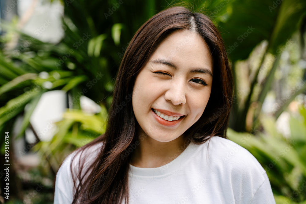 Cheerful smile beautiful asian woman in garden. Cheerful smile beautiful asian woman in garden.