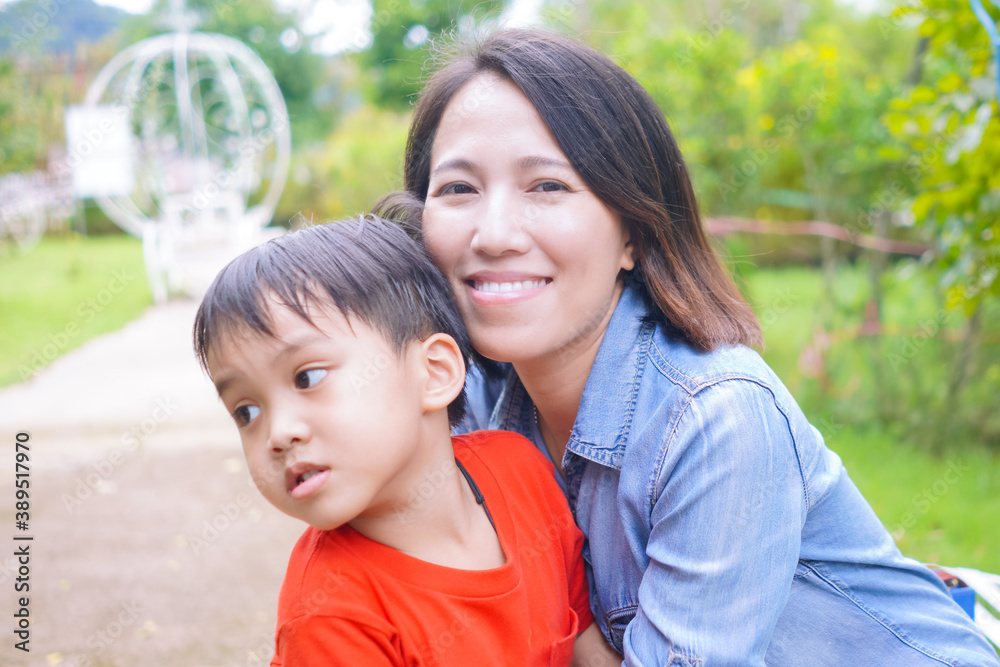 mother and child in park mother and child in park