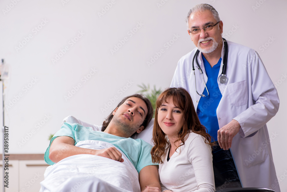 Fototapeta premium Young family at the hospital