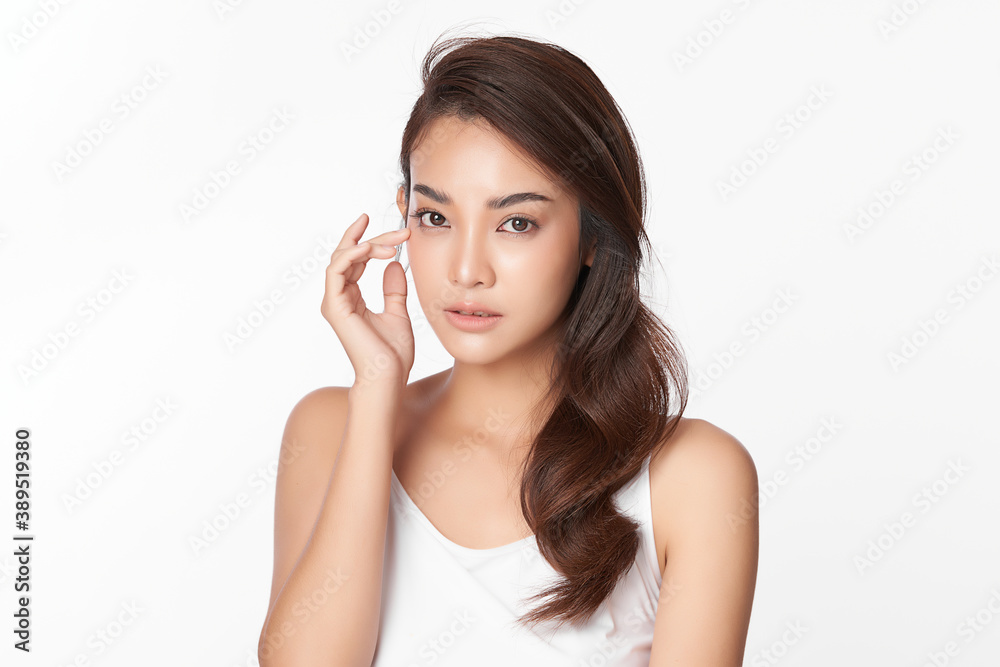 Beautiful young asian woman with clean fresh skin on white background, Face care, Facial treatment, Cosmetology, beauty and spa, Asian women portrait Beautiful young asian woman with clean fresh skin on white background, Face care, Facial treatment, Cosmetology, beauty and spa, Asian women portrait