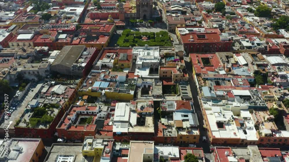 Pan Up Dolly In Reveals San Miguel de Allende City Center with Famous Cathedral. Parroquia de SAn Miguel Arcangel. Jardin Allende Pan Up Dolly In Reveals San Miguel de Allende City Center with Famous Cathedral. Parroquia de SAn Miguel Arcangel. Jardin Allende