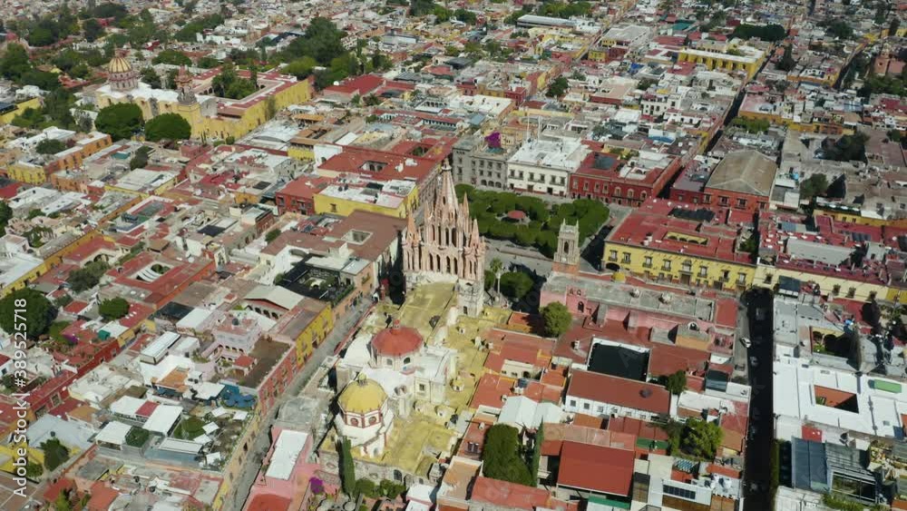 Drone Circles Above Iconic San Miguel de Allende Cathedral: Guanajuato, Mexico. Day Drone Circles Above Iconic San Miguel de Allende Cathedral: Guanajuato, Mexico. Day