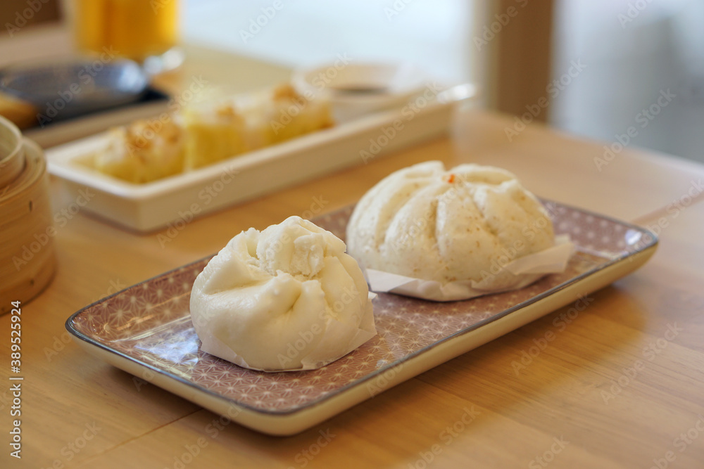 Steamed barbecue pork bun, Chinese dim sum traditional food style.