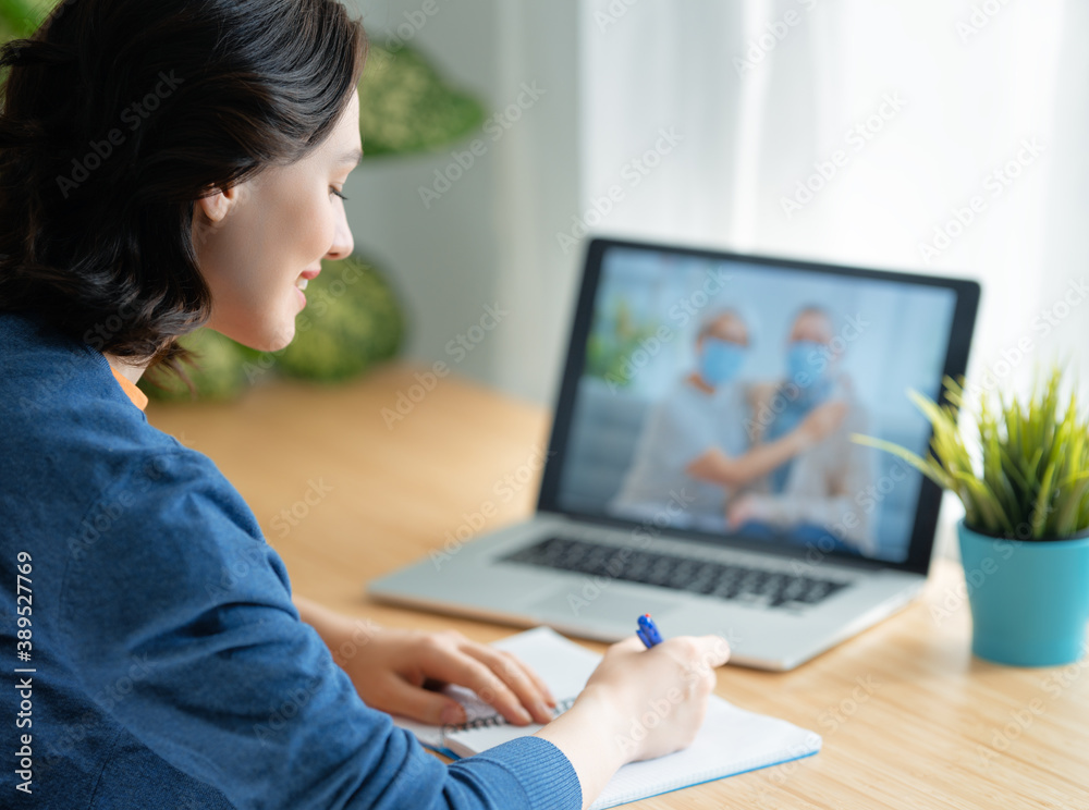 Woman is using pc for remote talking Woman is using pc for remote talking