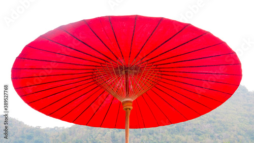 Red umbrella with blue sky and bright atmosphere
