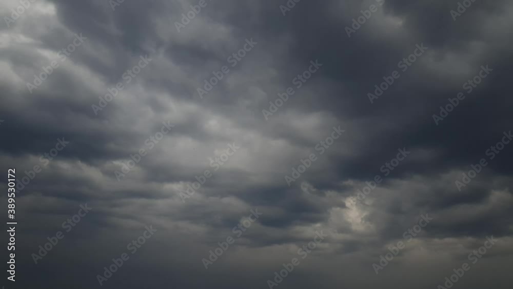 Free of any visual artifacts such as birds and insects, just a clean time lapse of very thick late afternoon dark thunderstorm clouds. Free of any visual artifacts such as birds and insects, just a clean time lapse of very thick late afternoon dark thunderstorm clouds.