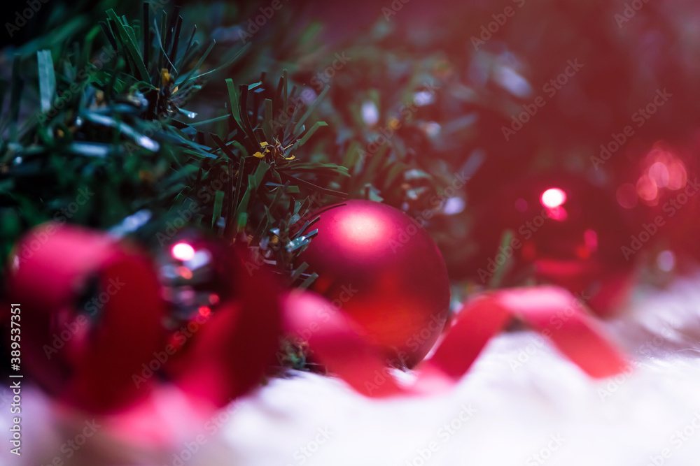 Christmas background ,Decorated Christmas tree on red bokeh blurred background 