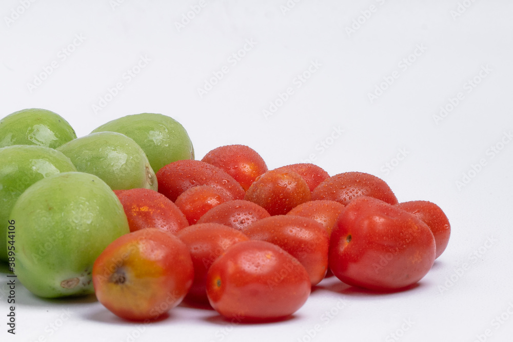 group of green and red cherry tomatoes group of green and red cherry tomatoes