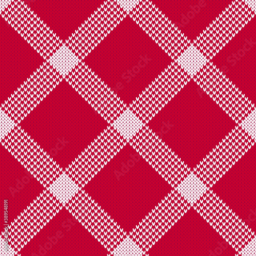 Red and white Christmas plaid sweater seamless diamond pattern.