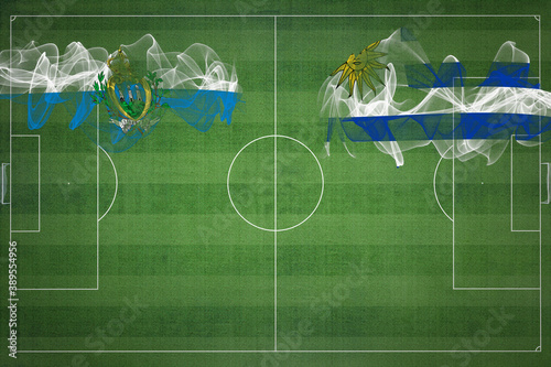 San Marino vs Uruguay Soccer Match, national colors, national flags, soccer field, football game, Copy space photo