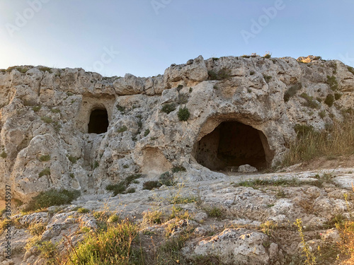 Caves along the canyon carved by the Gravina River where lies Matera, Basilicata, Italy