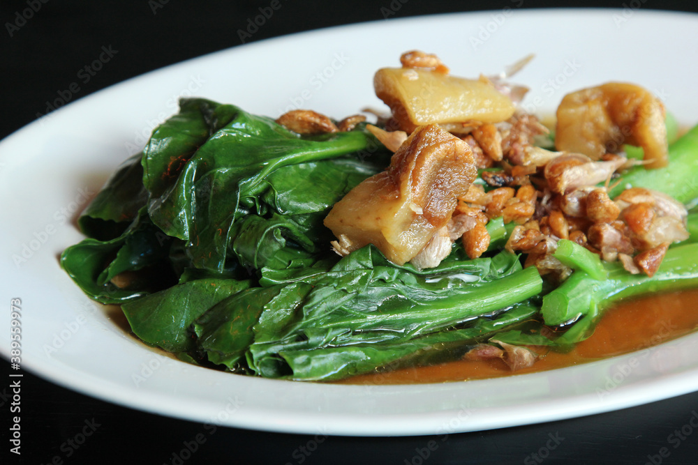 Hong Kong Kale stir fried in oyster sauce with garlic Hong Kong Kale stir fried in oyster sauce with garlic