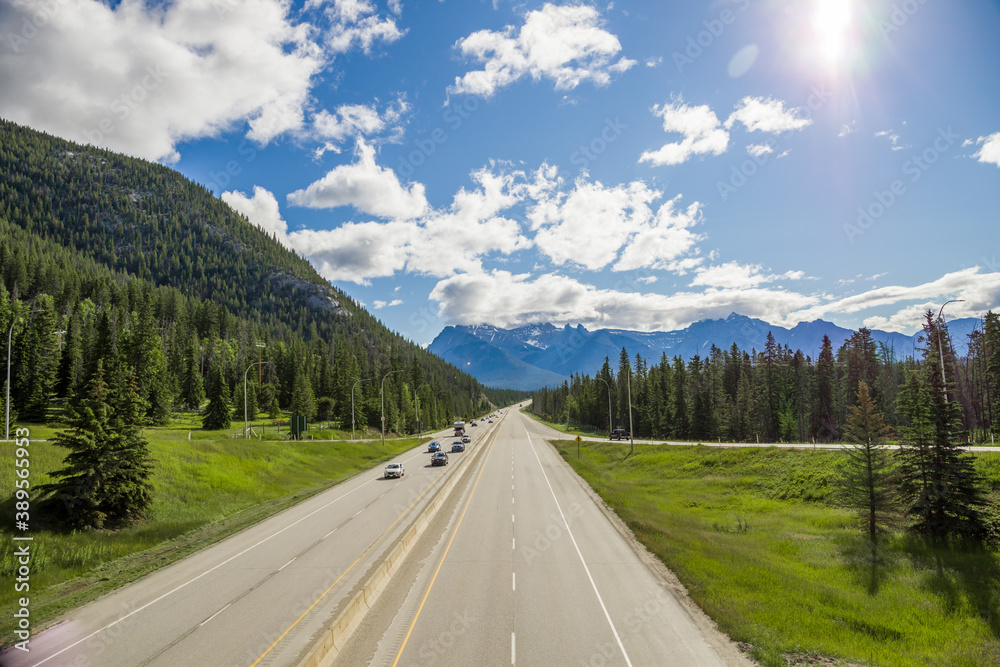 Highway road in mountain. Summer time. Banff, Alberta, Canada Highway road in mountain. Summer time. Banff, Alberta, Canada