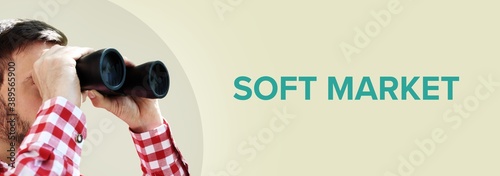 Soft Market. Man observing with binoculars. Turquoise Text/word on beige background. Panorama photo