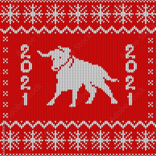Symbol of the year 2021. Greeting card with a knitted bull.