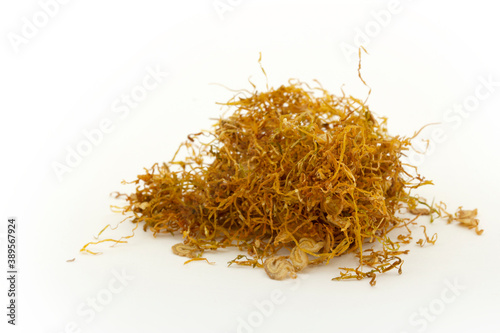  dried tobacco leaves on a white background