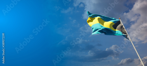 Beautiful national state flag of Bahamas with blank space. Bahamas flag on wide background with place for text 3D artwork.