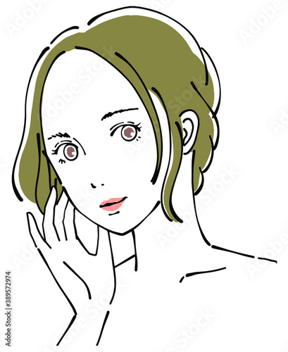 顔に手をあてる女性