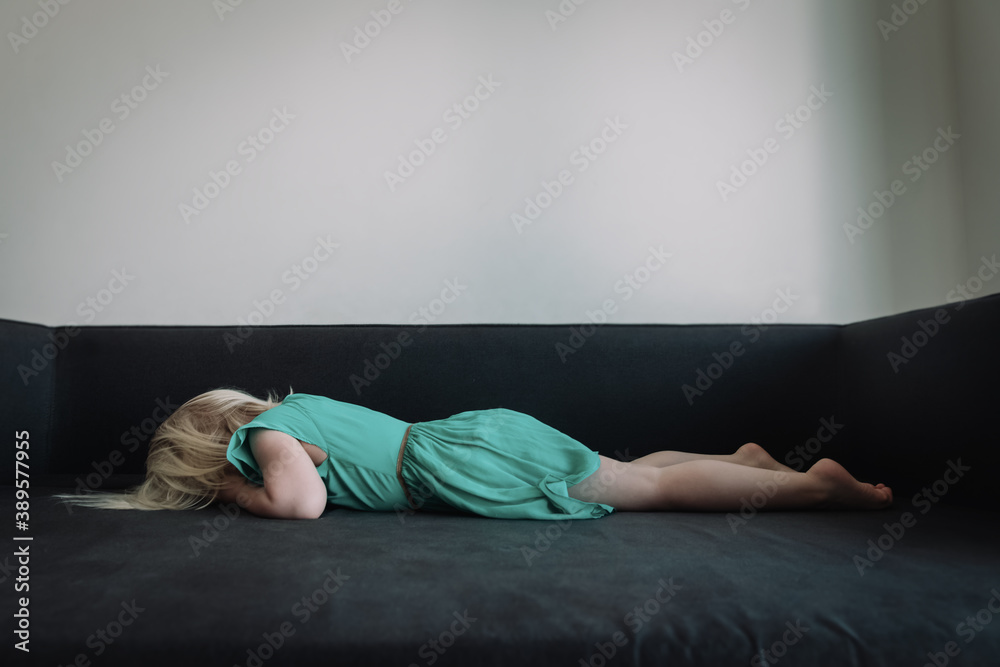 sad and stressed child, little girl bored from staying home sad and stressed child, little girl bored from staying home