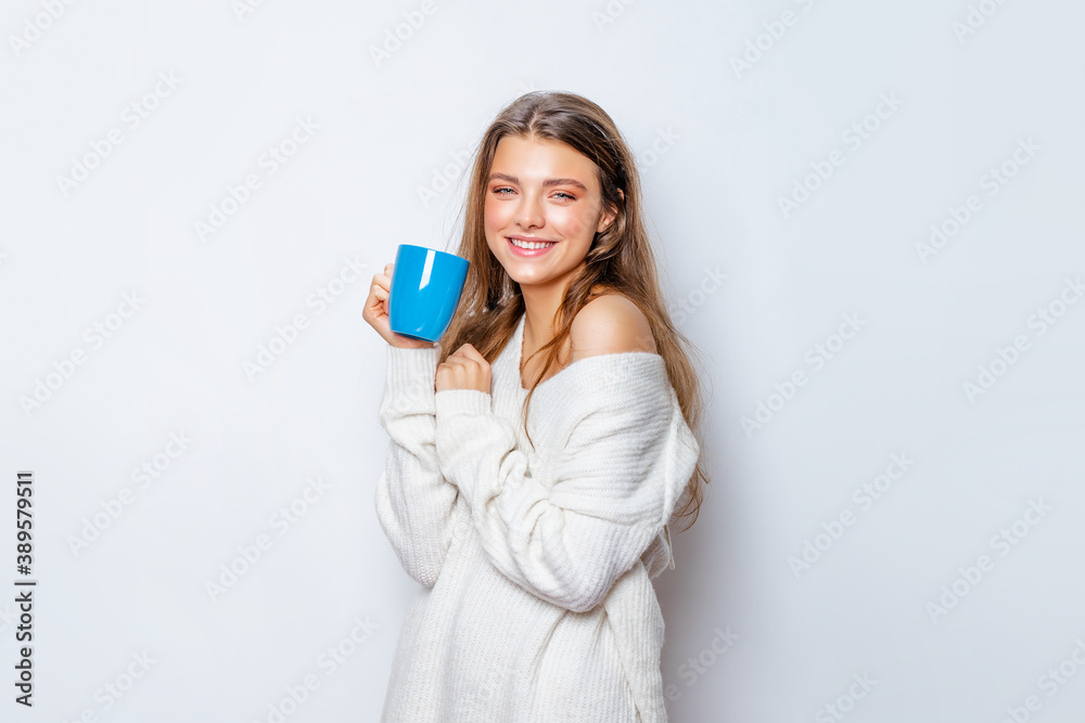 Morning Relaxation. Beautiful Girl in the Morning enjoy a Cup of Tea. Relaxation. Close-up. Morning Relaxation. Beautiful Girl in the Morning enjoy a Cup of Tea. Relaxation. Close-up.