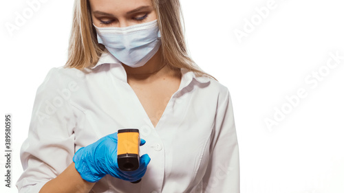 Young nurse holds her head with her hand from stress. High quality photo