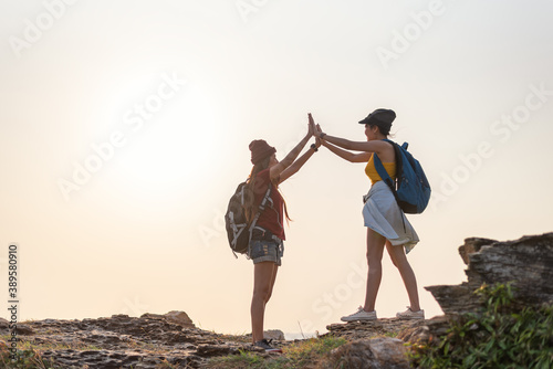 Happy hiker reaching the top.