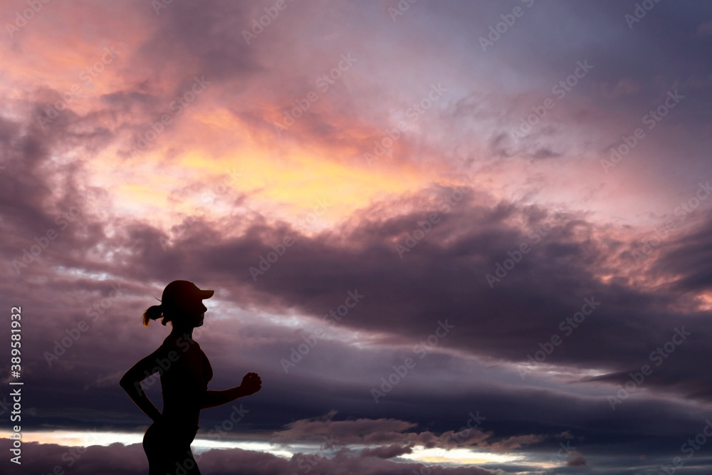 Runner during sunset - fitness work out concept Runner during sunset - fitness work out concept