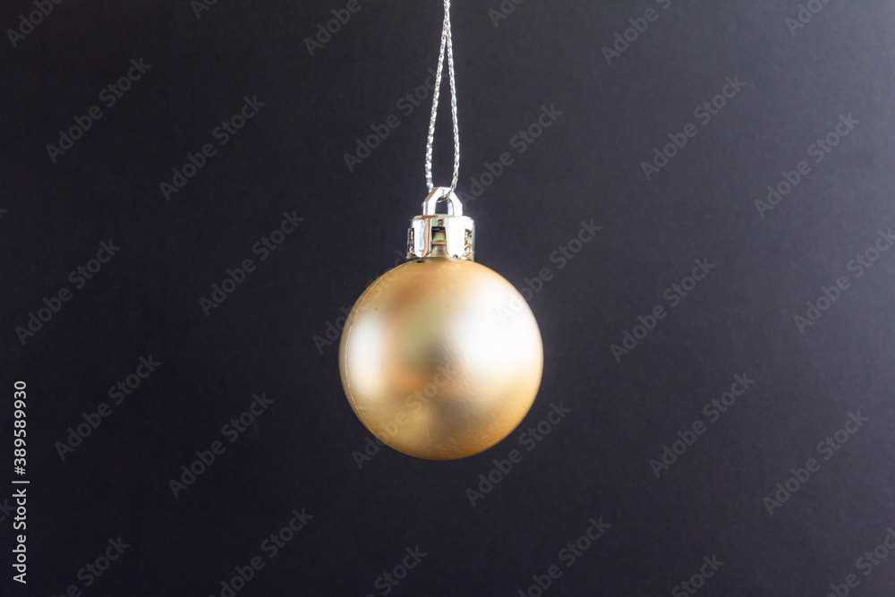 Christmas decoration yellow gold balls with black background. Christmas balls. Christmas decoration yellow gold balls with black background. Christmas balls.