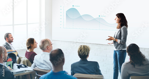 Businesswoman summarizing work in a meeting photo