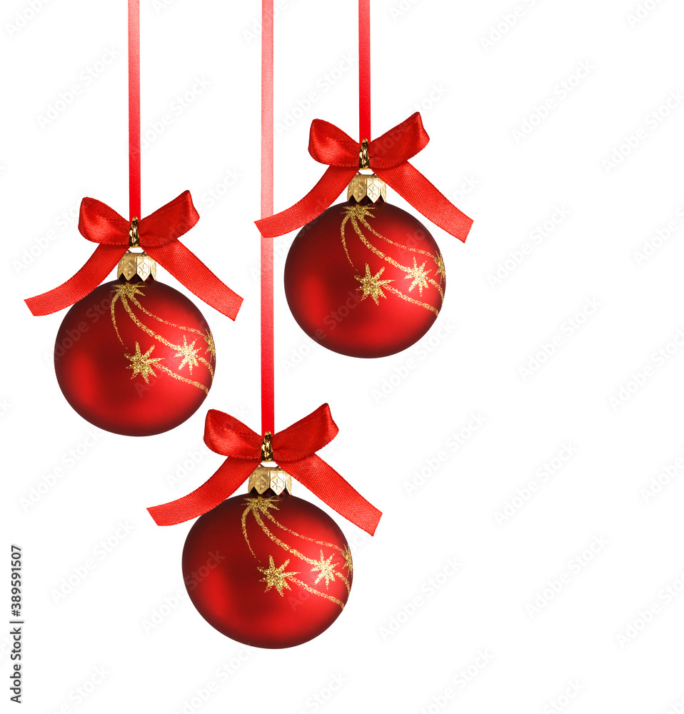 Christmas balls hanging with ribbons on white background Christmas balls hanging with ribbons on white background