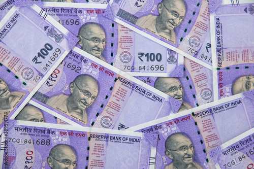 one hundred rupees bills - India new currency background