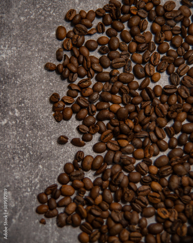 roasted coffee beans and a cup of coffee