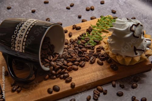 sweet cake and cup of coffee, coffee beans