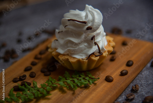 sweet cake and cup of coffee, coffee beans