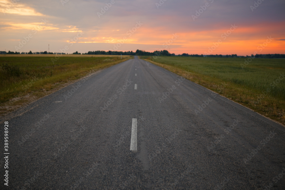 Fototapeta premium motorway at sunset of a summer day