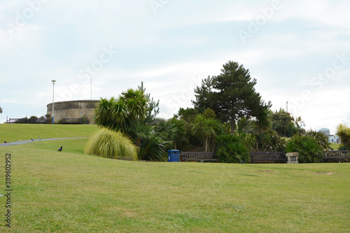 Grass slope with seating in front of historic Redoubt fortress in Eastbourne photo