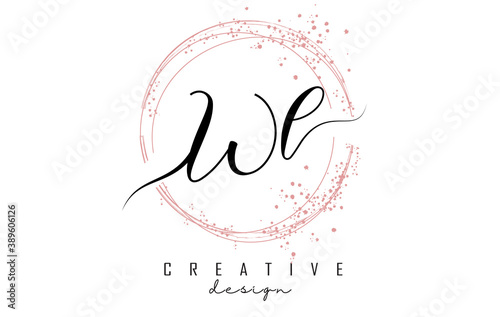 Handwritten WL W L letter logo with sparkling circles with pink glitter.