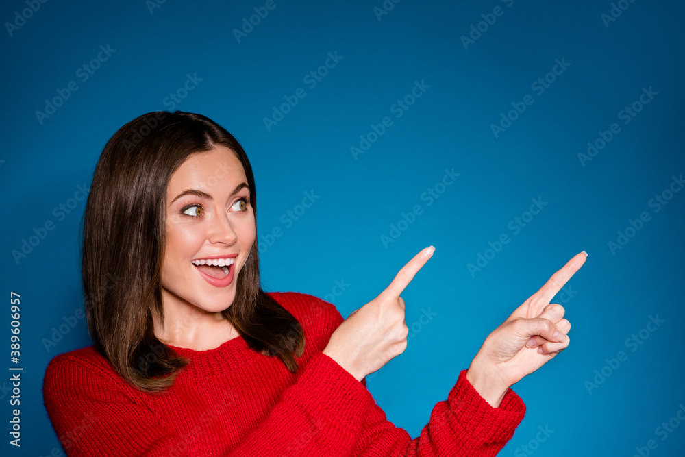Close-up portrait of her she nice attractive glad cheerful cheery girl showing new novelty gift present surprise presentation copy space isolated bright vivid shine vibrant blue color background Close-up portrait of her she nice attractive glad cheerful cheery girl showing new novelty gift present surprise presentation copy space isolated bright vivid shine vibrant blue color background