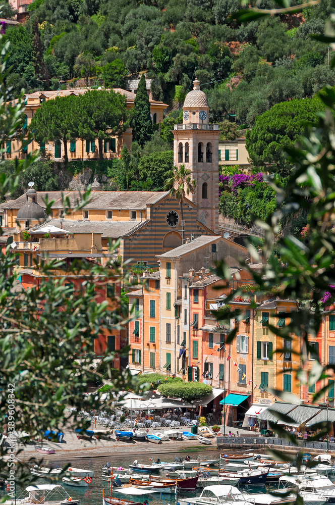 Portofino is a fishing village on the Ligurian Riviera south-east of Genoa, pastel-colored houses overlooking the cobbled square overlooking the harbor