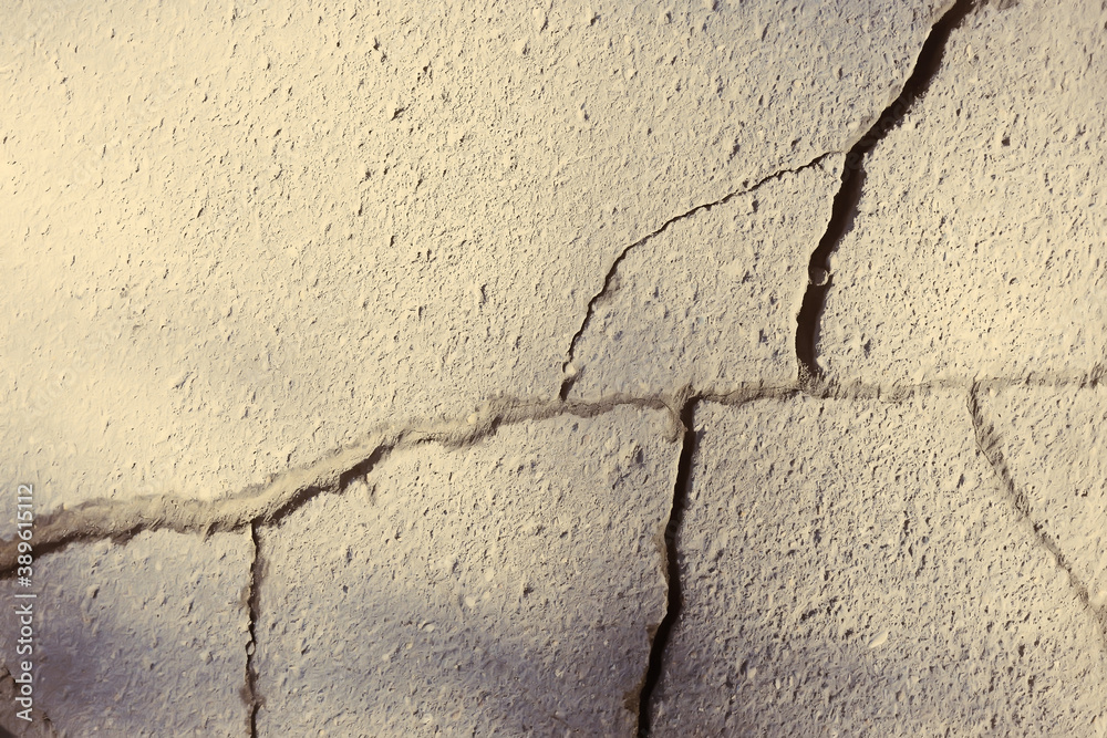 Obraz premium asphalt in cracks texture / abstract background cracks on asphalt road