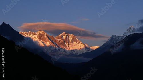 Stunning panorama view of Mount Everest massif  including Nuptse and Lhotse  and Ama Dablam with illuminated peaks in the evening sun before sunset from Namche Bazar  Khumbu  Himalayas  Nepal.