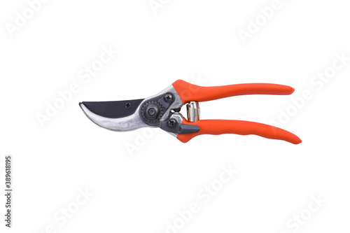 red gardening scissors on a white background