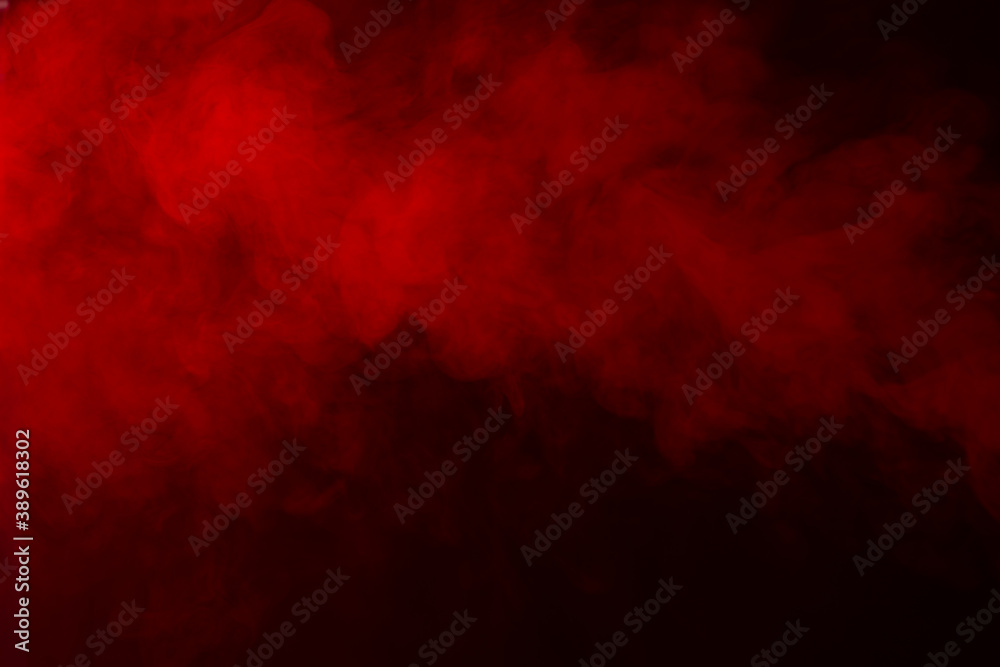 Red smoke texture on black background Red smoke texture on black background