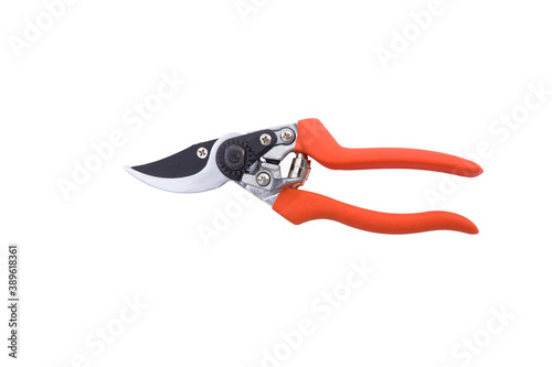 red gardening scissors on a white background
