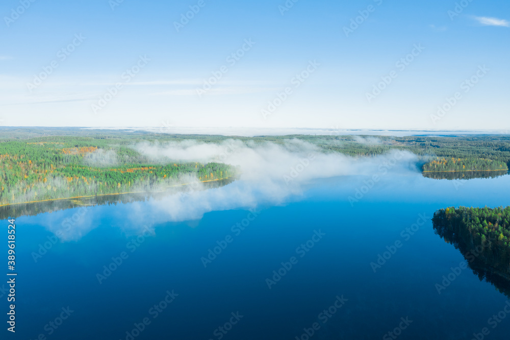 Early sunny morning
, fog over the lake. Finnish nature