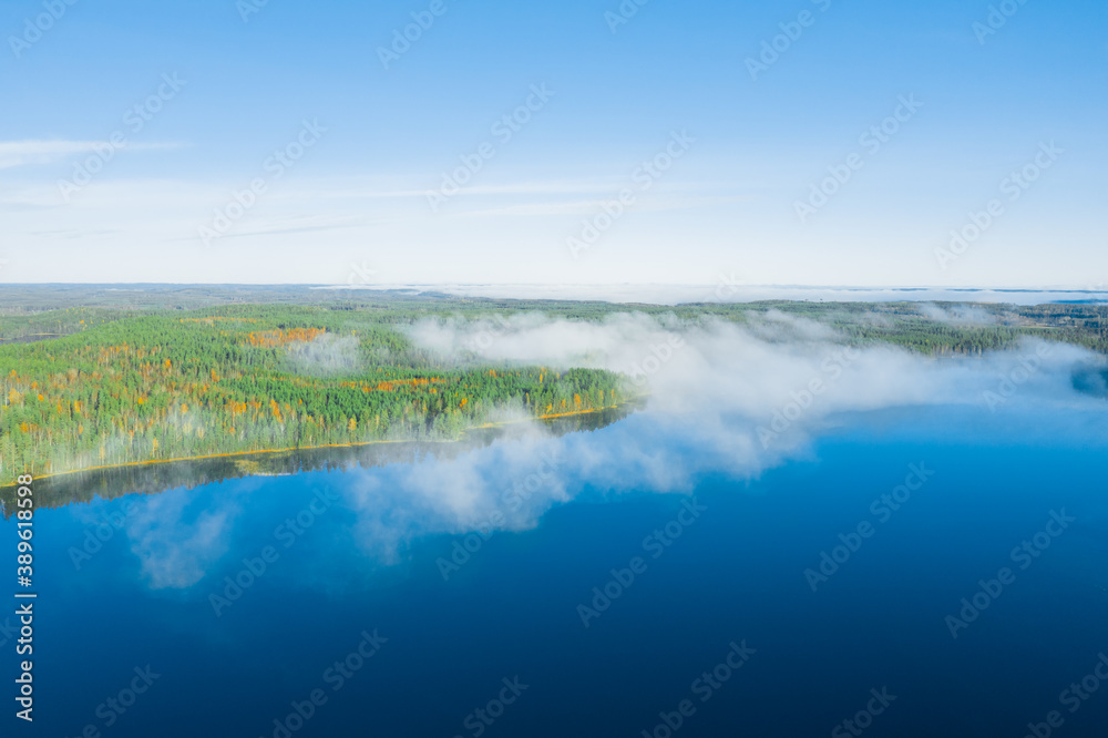 Early sunny morning
, fog over the lake. Finnish nature