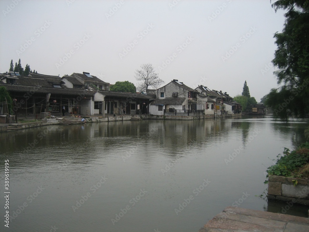 Fototapeta premium Historical Chinese house at river side