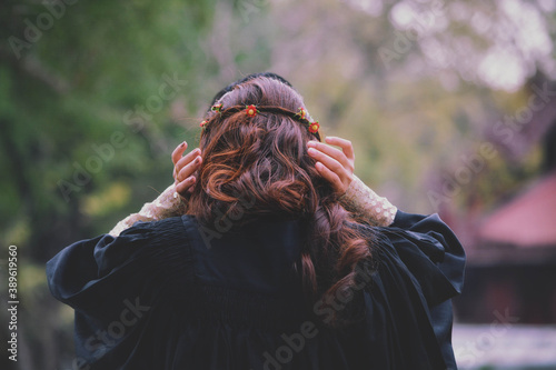 Graduation day of a girl preparing her hair