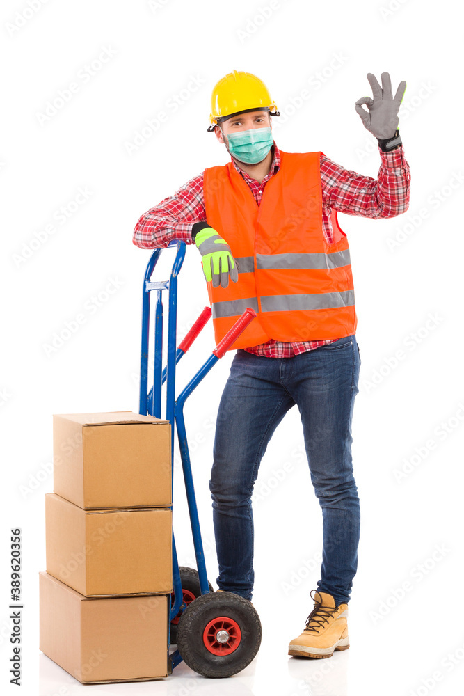 Worker In Face Protection Mask Is Showing Ok Hand Sign